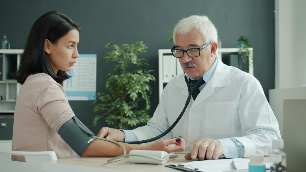 Primary care doctor with a patient